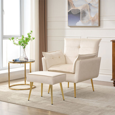 Fauteuil en velours capitonné avec repose-pieds Vaishal