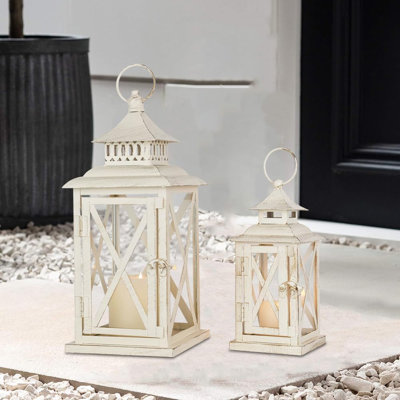 Set of 2 Beige Metal and Glass Decorative Lanterns, 14" and 10" Candle Holders for Indoor and Outdoor Decor
