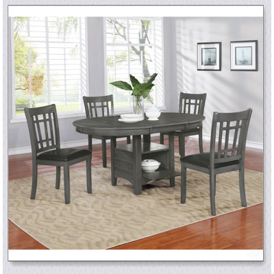 Table de salle à manger ovale extensible et polyvalente, dotée d'une construction durable pour des sièges flexibles et des réceptions élégantes à la maison.