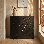 Armoire de rangement à 2 portes NTC BLOOM, armoire d'appoint design en bois massif avec portes à motif géométrique sculpté à la main, système de rangement modulaire et extensible pour le salon, noir brûlé