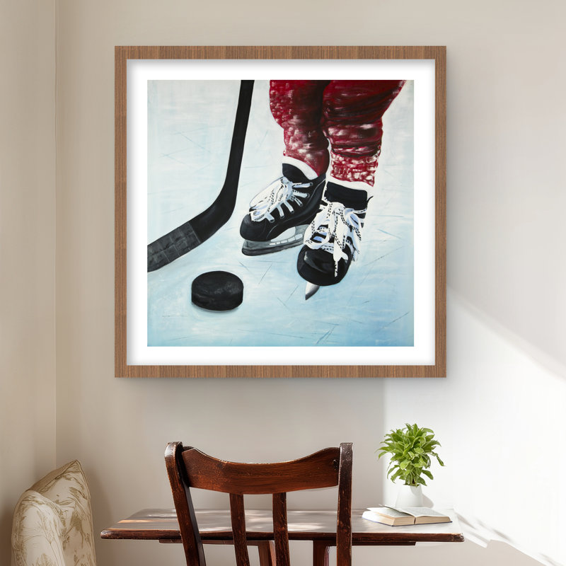 Jeune joueur de hockey - chaussures rouges encadrées