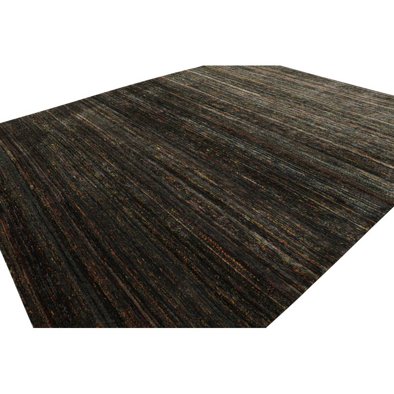 Rug & Kilim’S Oversized Textural Rug In Black With Bold Polychromatic Striae