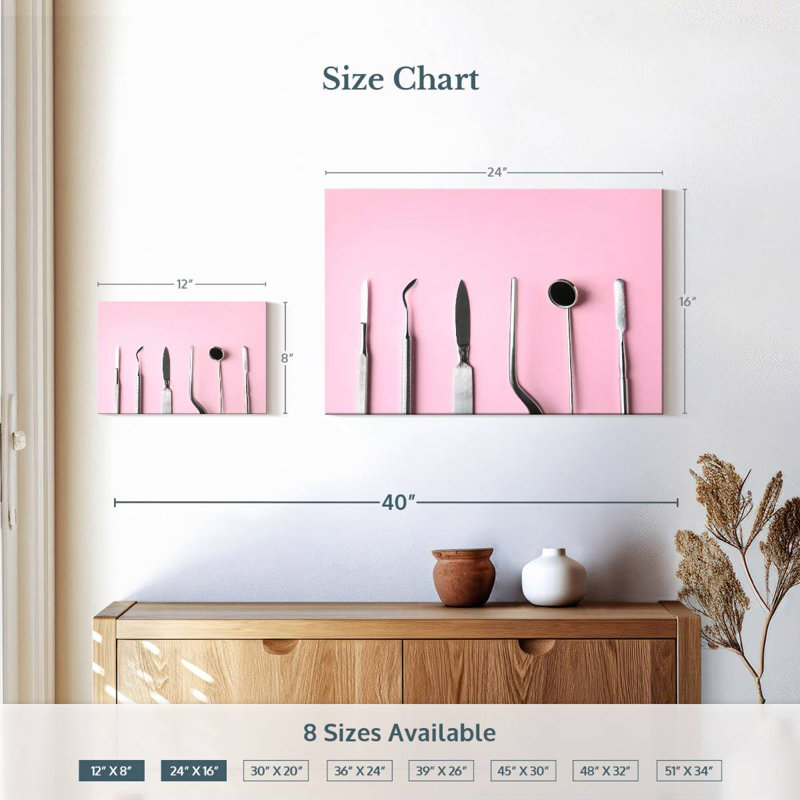 Outils dentaires sur fond rose, H 16 po x l 24 po