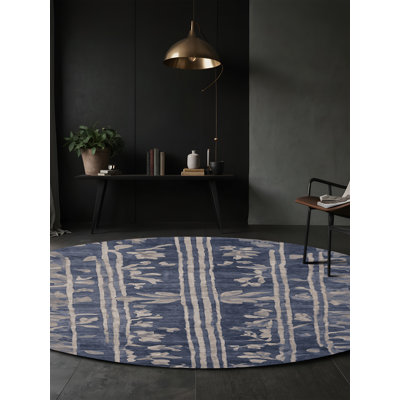 Tapis gris soyeux et moelleux
