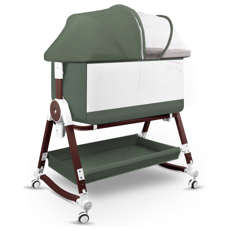 4 in 1 Baby Bassinet Bedside Sleeper & Co-Sleeper W/ Wheels, Storage Basket, Adjustable 7 Heights, Mosquito Net, Breathable Mesh Cradle for Infants Toddler,Green