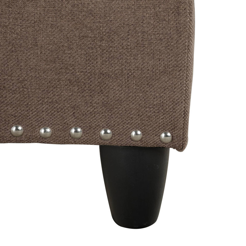 Canapé modulaire en tissu brun avec repose-pieds