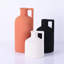 Vase sphérique orange en céramique avec poignée-135101374