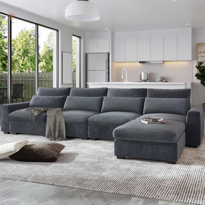 Grand canapé modulaire rembourré en plumes en L moderne, canapé convertible avec méridienne réversible pour le salon