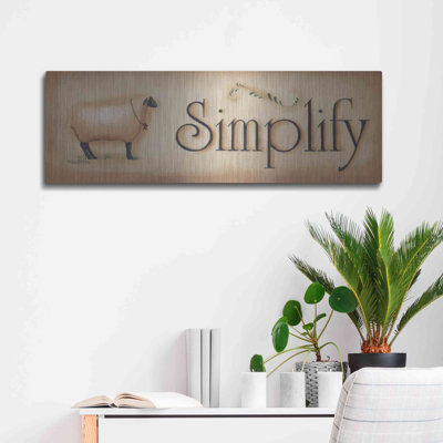 «Simplifier» par Pam Britton, art mural en métal