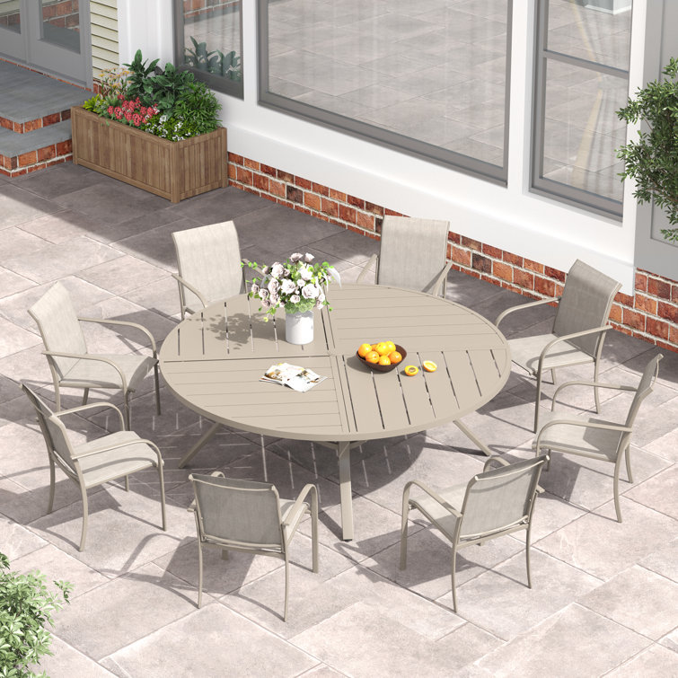 Round Patio Dining Set with 60" Metal Dining Table and 8 Stackable Armrest Textilene Chairs