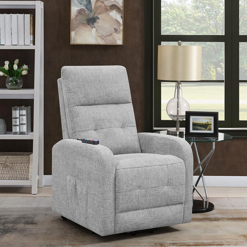 Fauteuil inclinable gris capitonné
