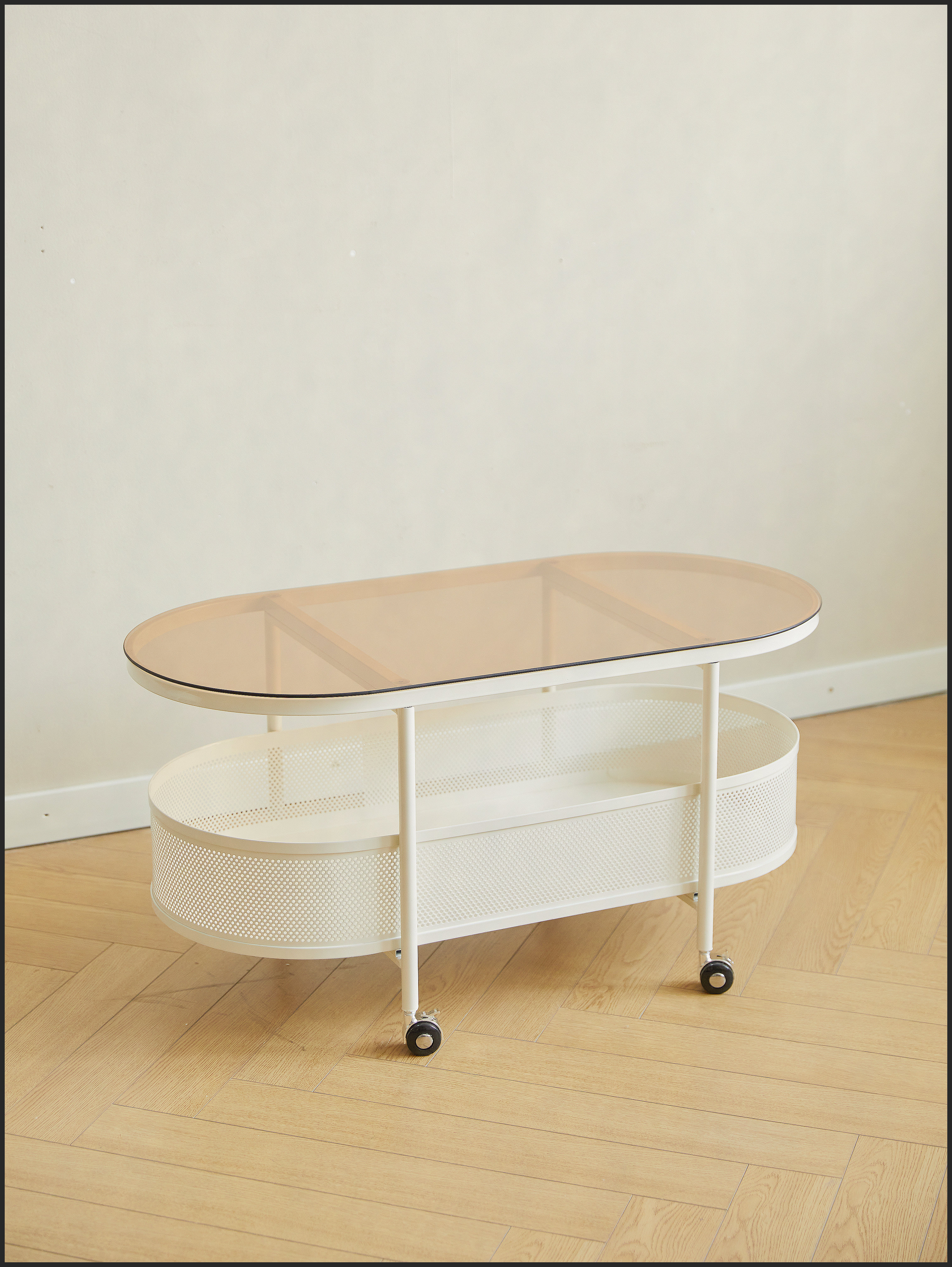 Moveable Run Off Table Latitude Run® Movable Oval Metal and Glass Coffee Table with Storage ...