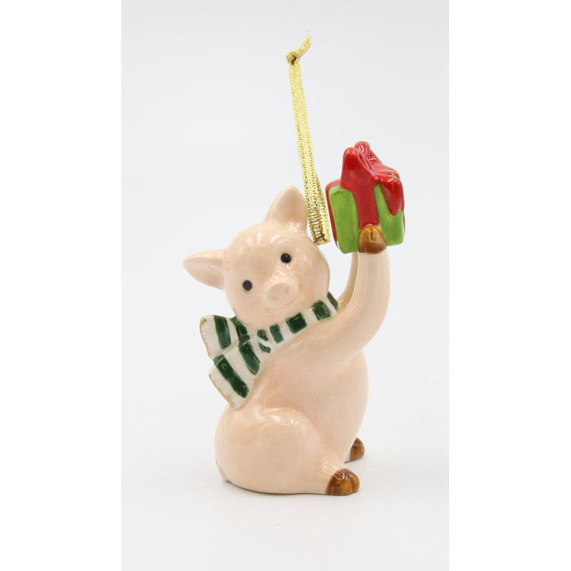 Cochon de Noël tenant un cadeau - 8,9 cm (H)