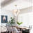 Ingimundur 24" Modern 8 - Light Dimmable Tiered Chandelier with Glass Feather Shades