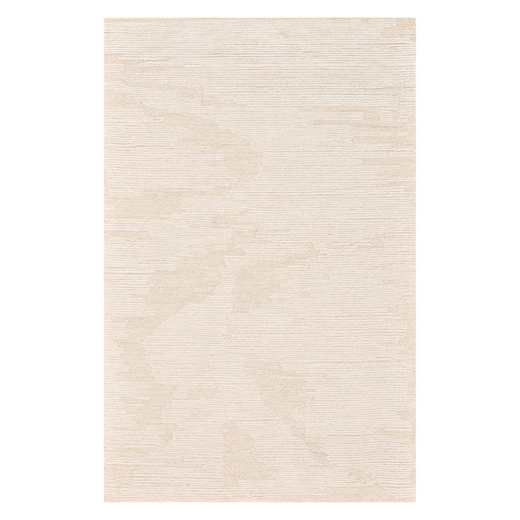 Niquan Abstract Ivory Hand-Hooked Area Rug