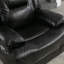 Fauteuil de cinéma inclinable et berçant-436837702