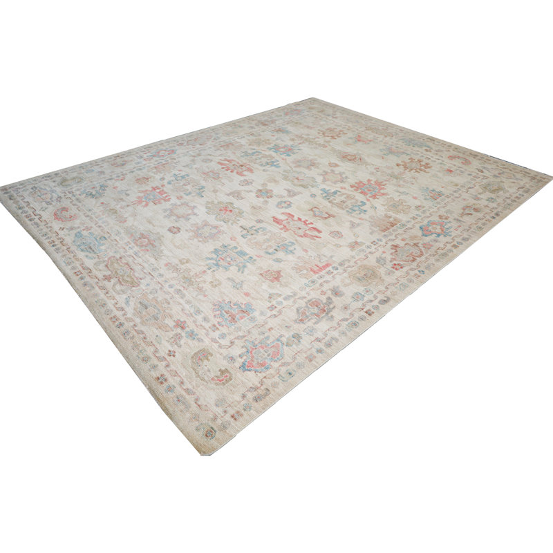 Hand Knotted Wool Area Rug in Cream