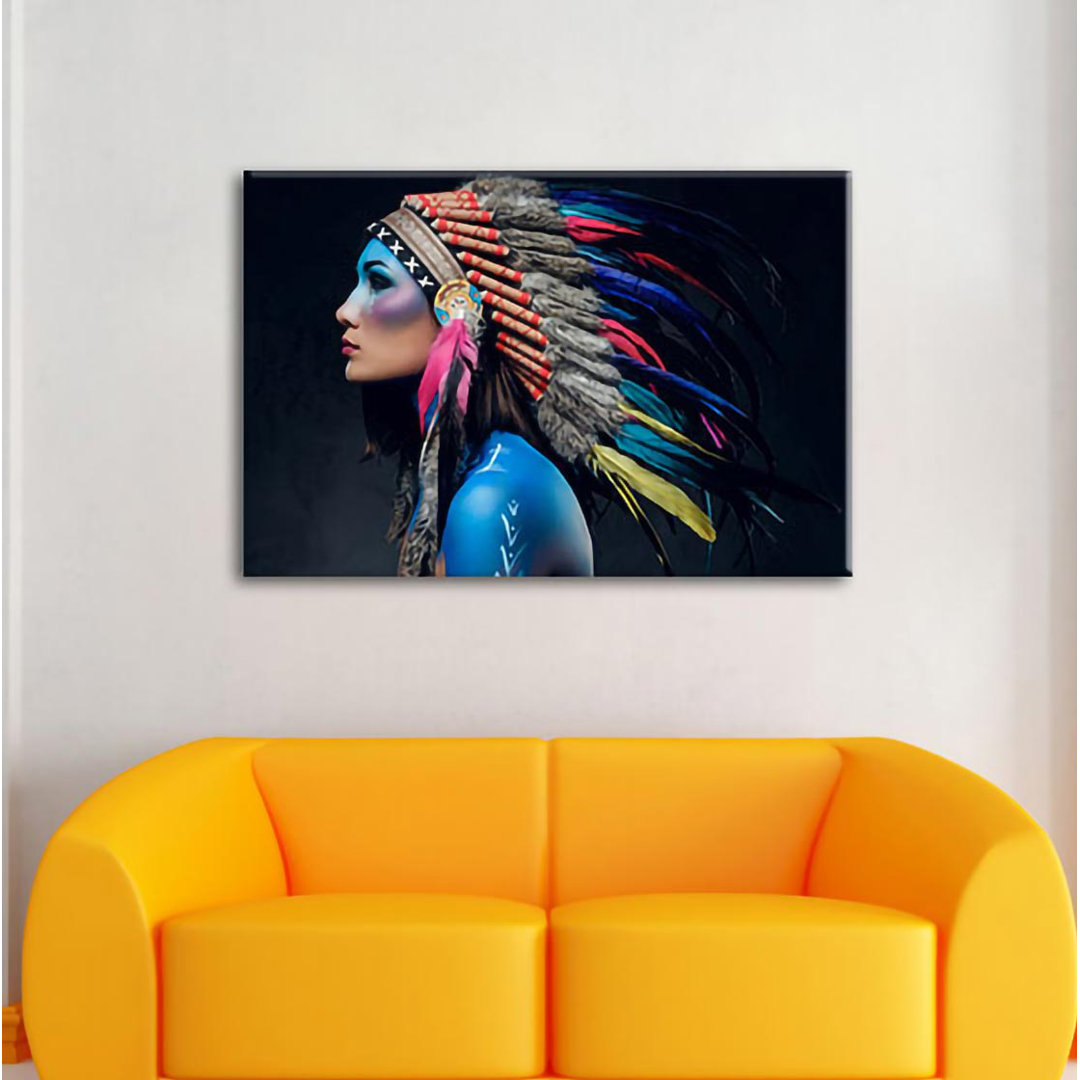 Leinwandbild Frau mit buntem Indianerkopfschmuck