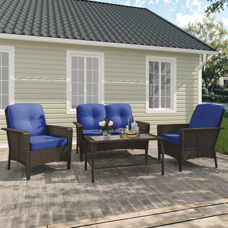 4-Piece Rattan Outdoor Sofa Seating Group with Cushions: Includes Loveseat, 2 Armchairs, and Coffee Table - Premium Patio Furniture for Backyard or Deck