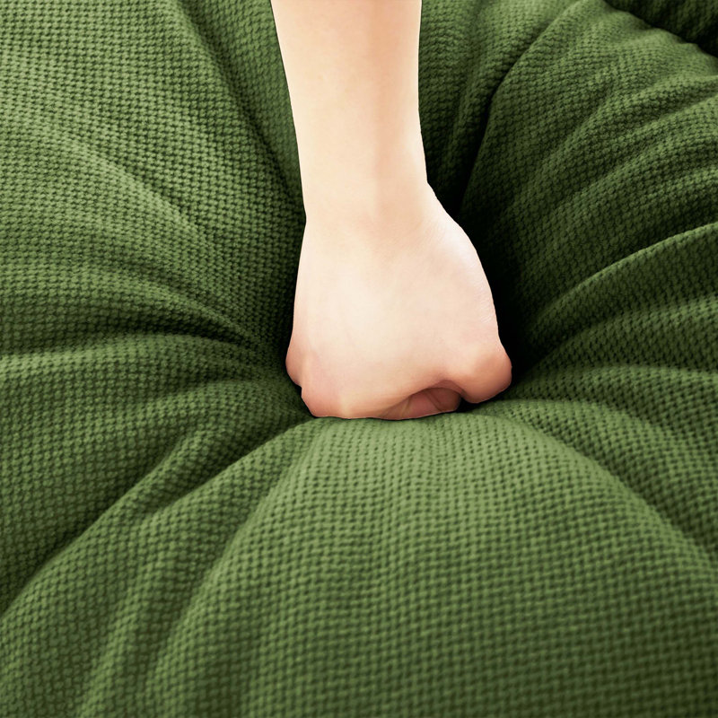 Canapé en L 2 places en chenille plissée vert avec repose-pieds, accoudoirs arrondis courbés et 2 coussins ronds