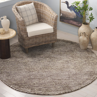 Kedwin Ebony Hand Tufted Wool Cotton Rug in Beige