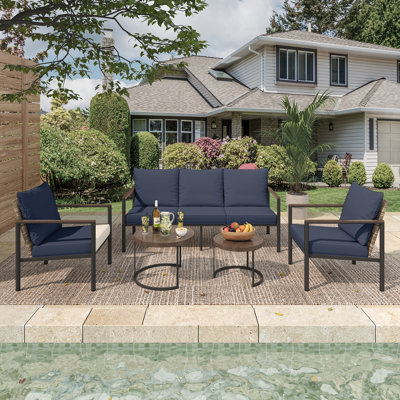 4-Piece All-Weather Wicker Patio Set: 3-Seat Sofa, 2 Chairs,A Tea Table with Cushions - Perfect for Poolside & Backyard