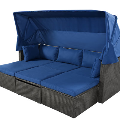 Lit de jour de terrasse avec auvent rétractable et coussins confortables pour le patio extérieur