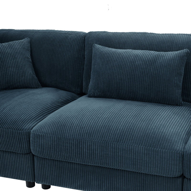 Canapé d'angle modulaire en velours côtelé bleu foncé, 144 po L x 72 po P x 33 po H. Aménagement personnalisable.