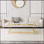 Table basse moderne et minimaliste à structure en métal doré avec pieds en acrylique, durable et élégante pour tout espace de vie