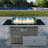 Propane Gas Fire Pit Table With Glass Wind Guard And An Open Basket-wave Patterned Wicker-1550162228