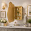 Armoire de toilette à miroir en forme de nuage irrégulier (33,5 x 22 cm) avec étagères en verre ajustables et cadre en métal doré mat, idéale pour la salle de bain et l'entrée.-1043736897