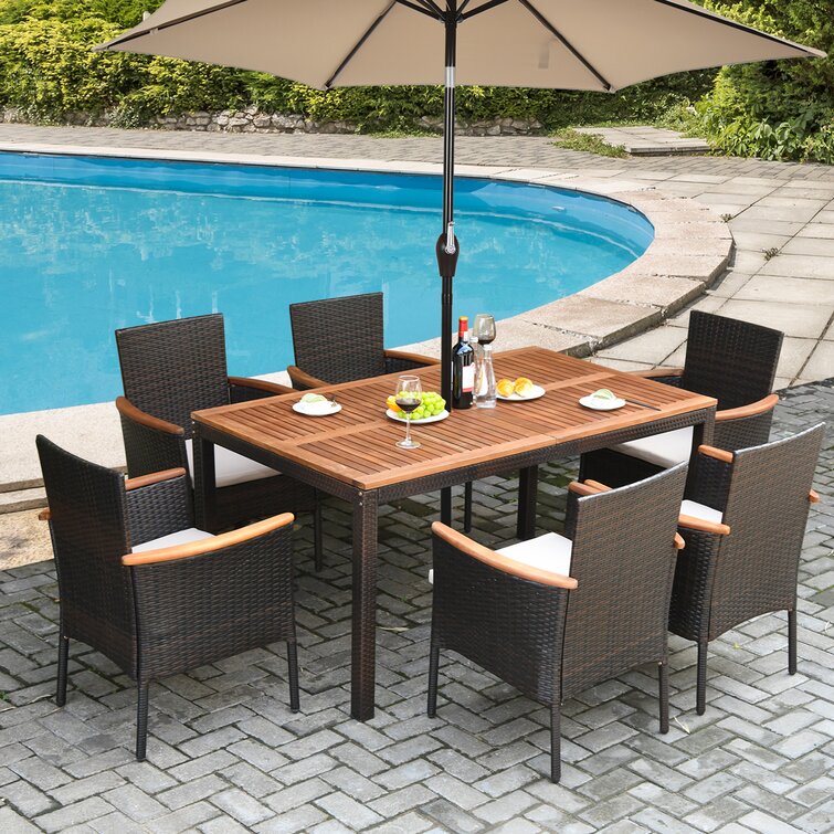 Chaley Rectangular 6 - Person 59'' Long Dining Set with Cushions and Umbrella Hole