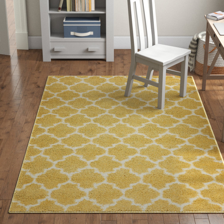 Tapis jaune / ivoire à motif géométrique Abdirizak