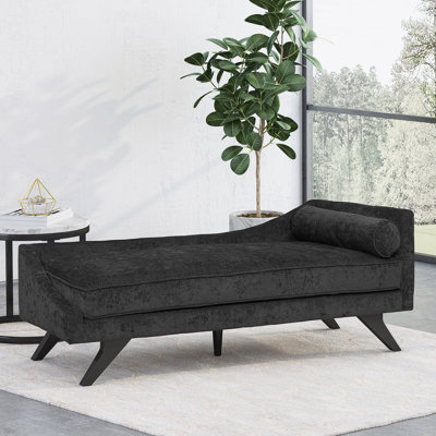 Chaise longue rembourrée avec petit coussin décoratif