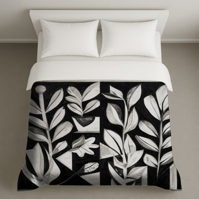 Housses de couette noires et blanches