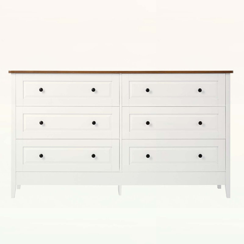 Commode pour la chambre à coucher avec 6 tiroirs spacieux, une surface supérieure large et des poignées en métal, pour un rangement organisé et un décor moderne.