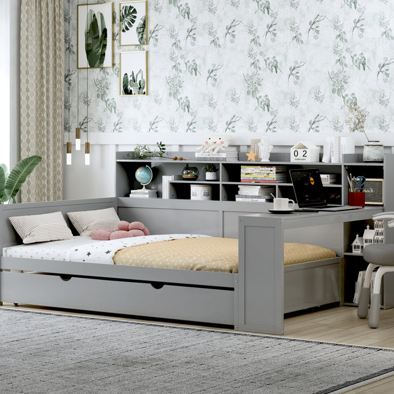 Lit de jour double en bois au fini gris avec lit gigogne, bureau d'étude et rangement pour maximiser l'espace dans la chambre à coucher