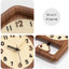 Horloge murale brune en bois massif