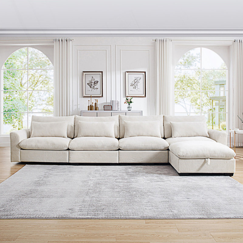 Grand canapé modulaire en forme de L avec repose-pieds avec rangement et 4 coussins de taille