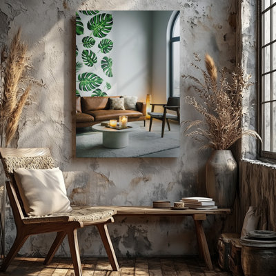 Toile d'un salon moderne avec une grande feuille vibrante de Monstera, art mural sur un mur gris clair créant un art mural frais et pour toile