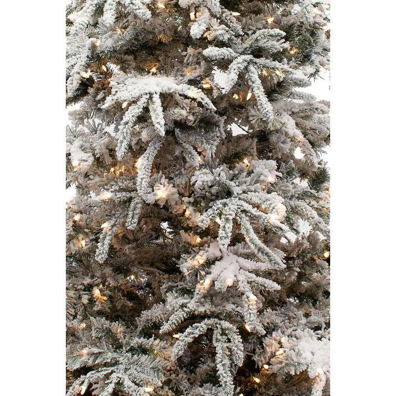 12-Foot Flocked Pine Artificial Christmas Tree with Warm White LED Lights