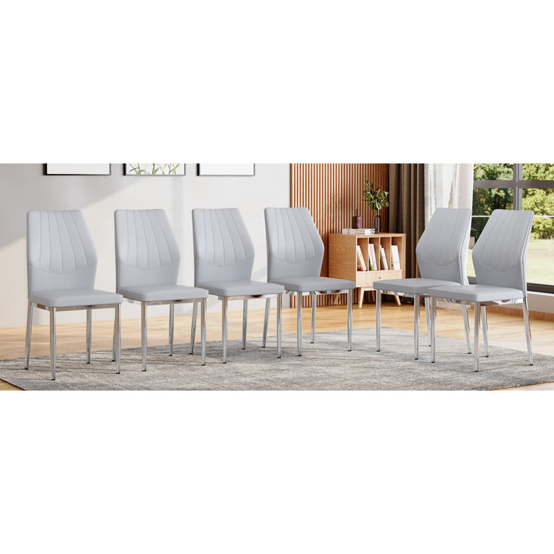 Chaises de salle à manger ergonomiques en cuir synthétique, structure en métal, élégance moderne pour la maison