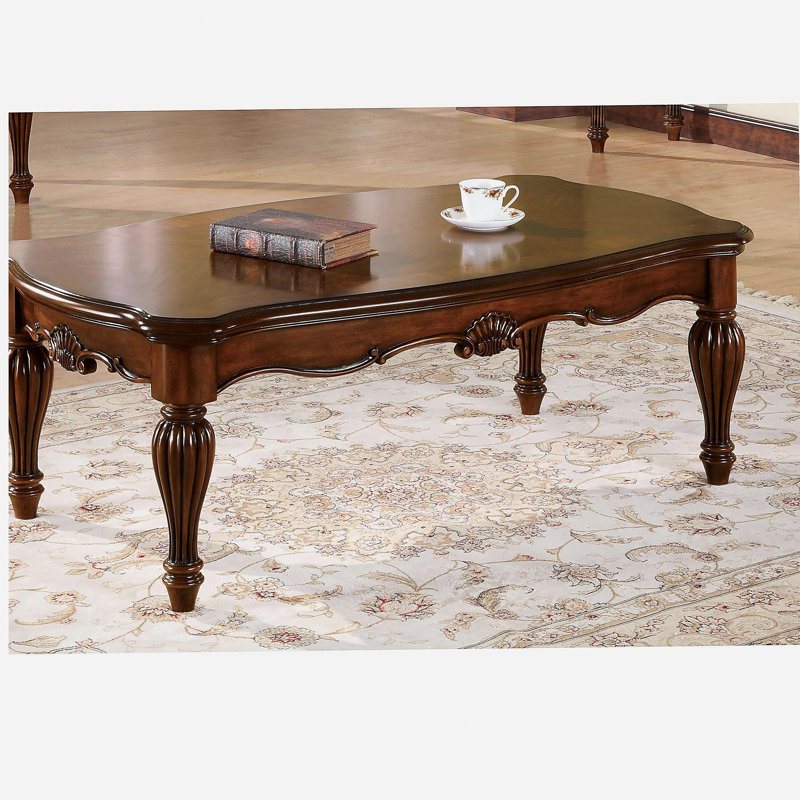 Table basse cerise rectangulaire avec pieds tourbillon