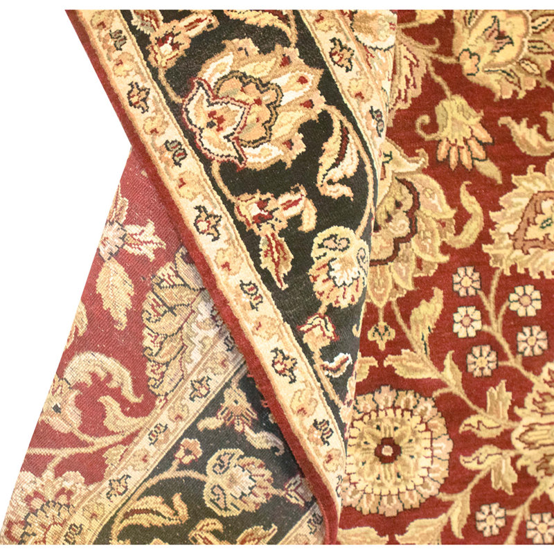 High-quality hand-knotted red and black area rug