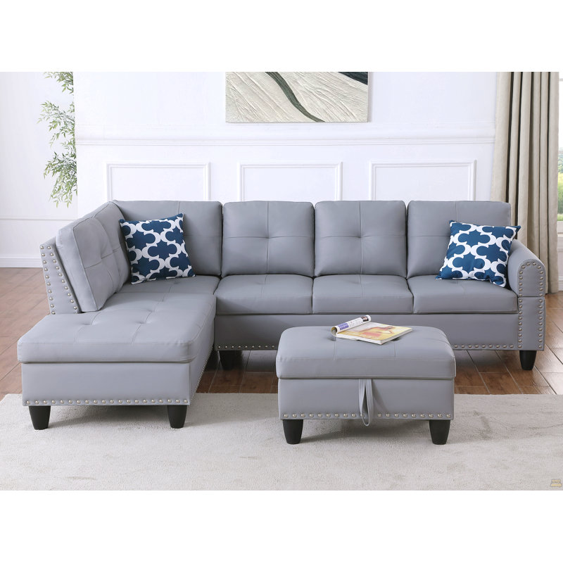 Canapé modulaire en faux cuir gris avec repose-pieds en L