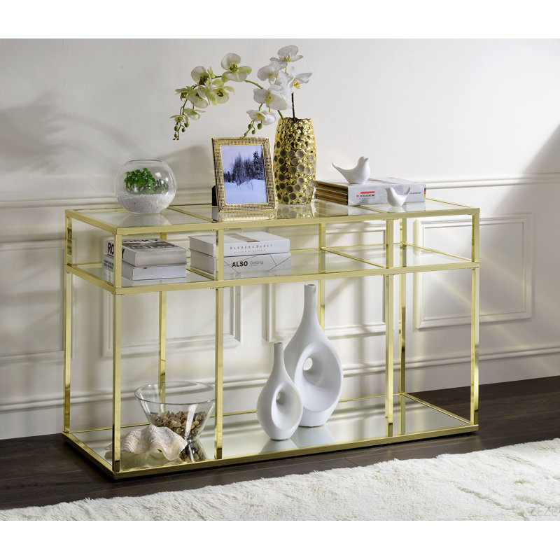 Table de canapé en verre transparent et finition dorée