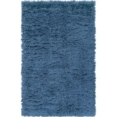 Tapis à poils longs en polyester de couleur unie bleu tissé à la machine Almodovar