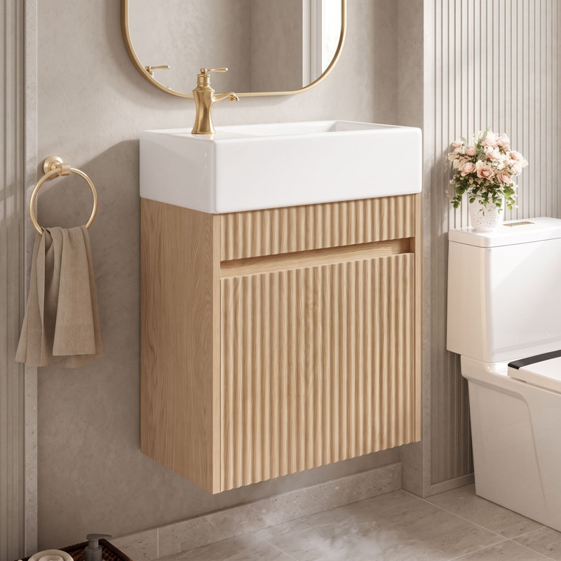 Meuble-lavabo suspendu de 47 cm (18,5 po) avec lavabo réversible en résine (gauche ou droite) et porte à ouverture par simple pression