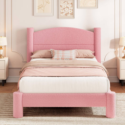 Structure de lit plateforme simple rembourrée en coton rose avec pieds de colonne arrondis, tête de lit rembourrée et support de lattes de matelas pour chambre dortoir