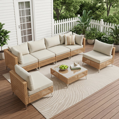 Ensemble de conversation modulaire d'extérieur en osier 7 pièces, canapé modulaire de patio avec coussins beiges épais résistants à l'eau et table basse pour porche de jardin